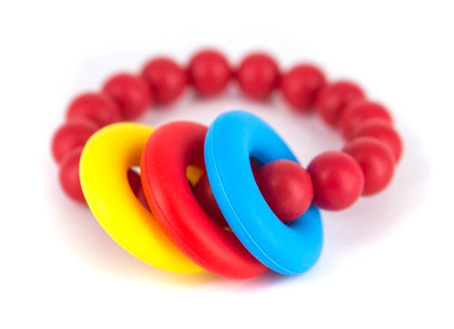 bijtarmband Donut Teether 6,5 cm silicone rood